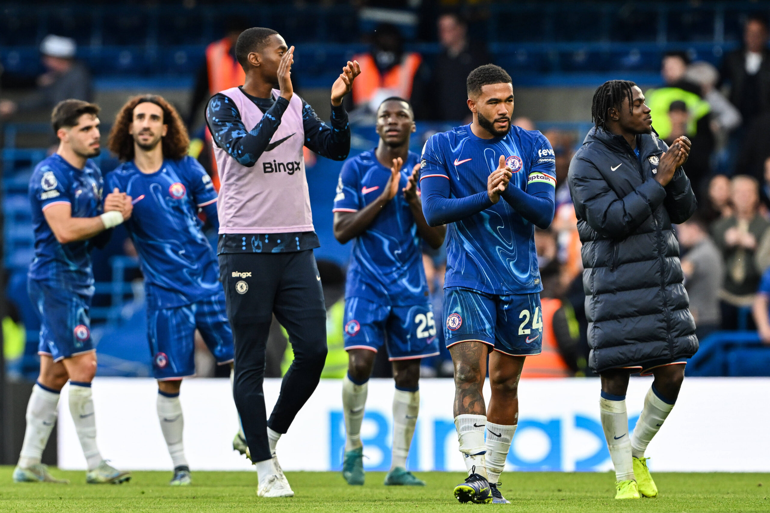 Reece James applauds Chelsea fans with fellow players