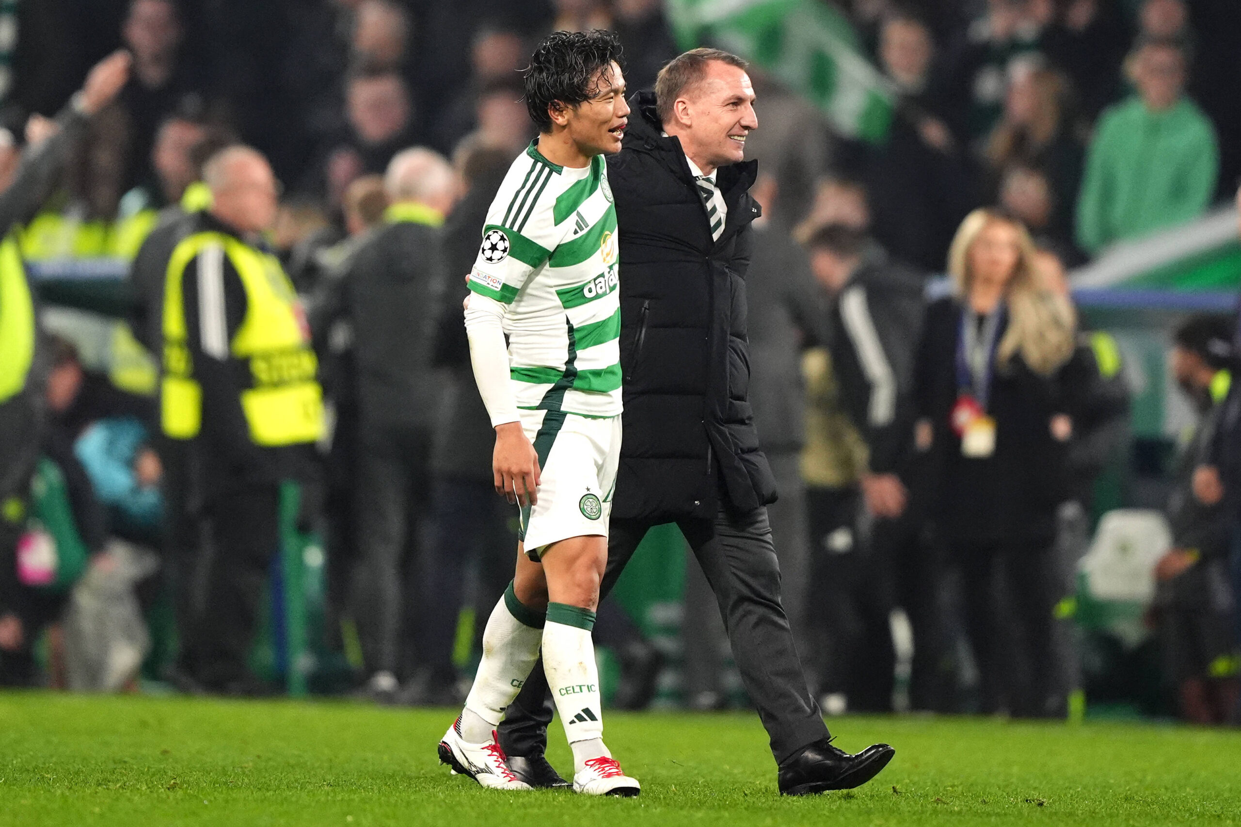 Celtic manager Brendan Rodgers (right) and Reo Hatate celebrate victory