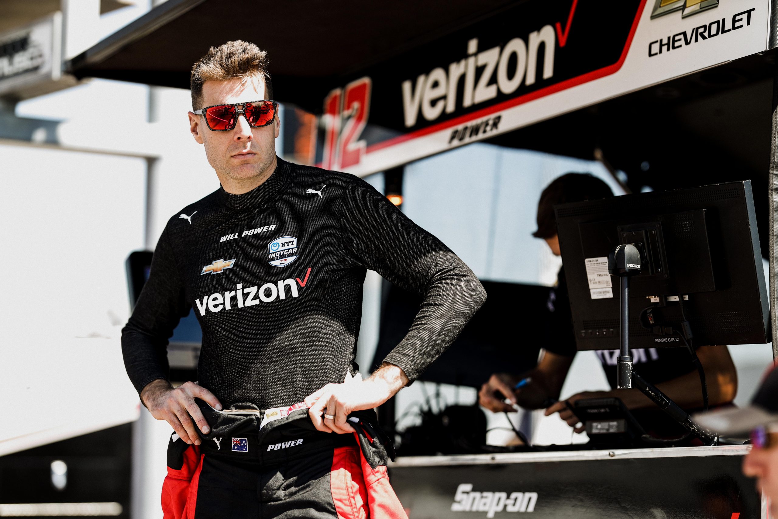 Team Penske driver Will power standing in pit lane in 2022