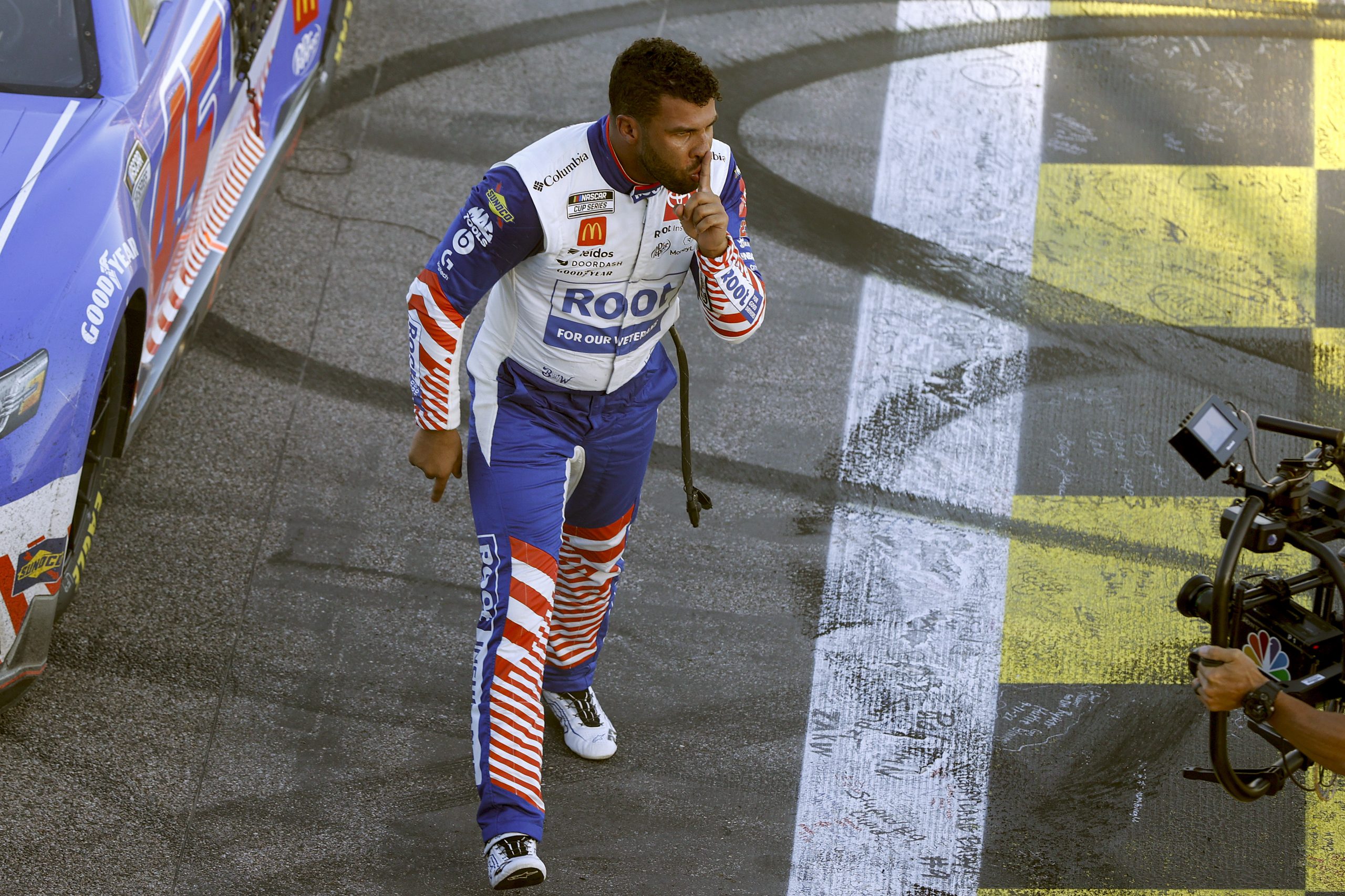 Bubba Wallace celebrates after winning at Kansas Speedway