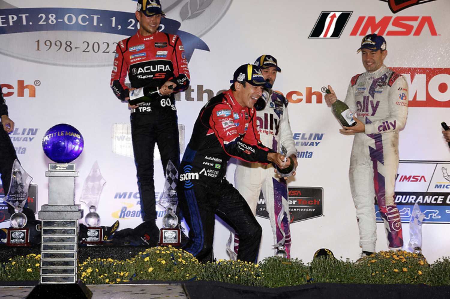 Helio Castroneves celebrates his victory at the 2022 Petit Le Mans