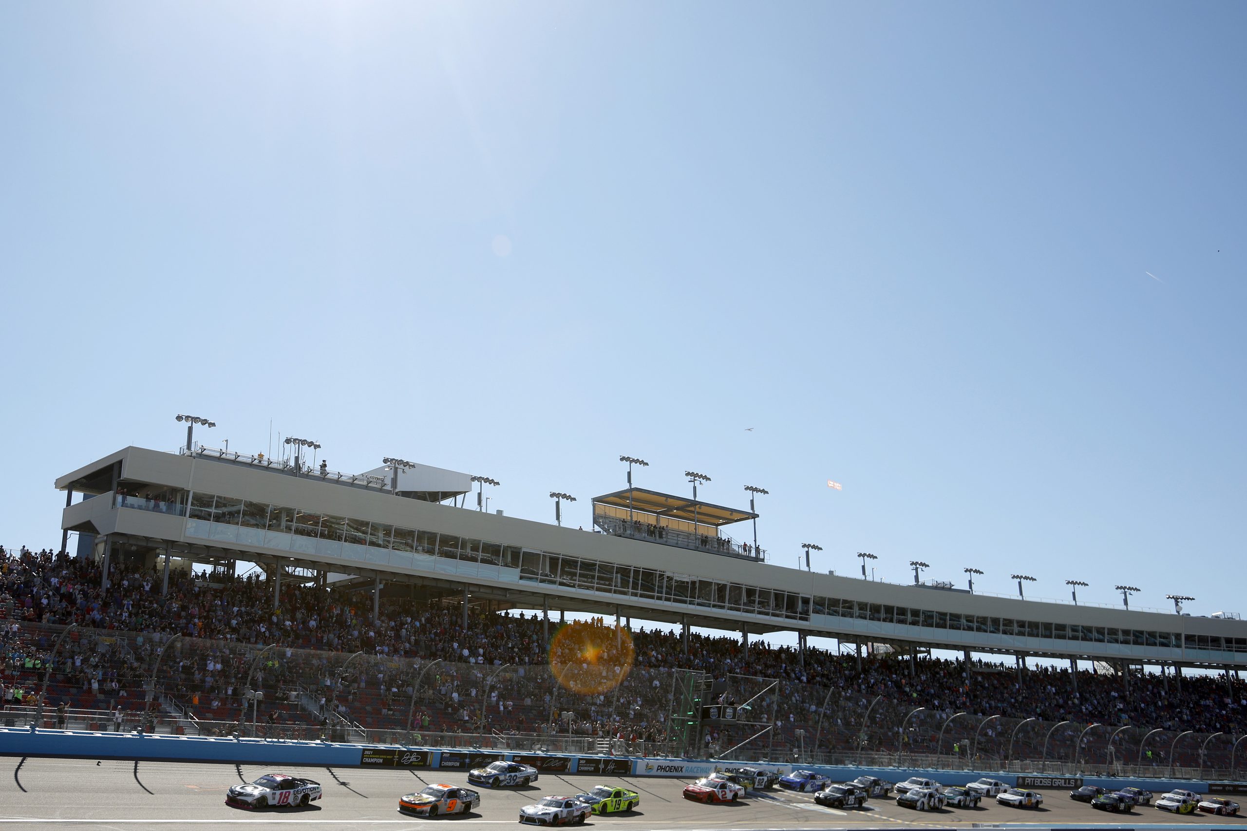 AVONDALE, ARIZONA - MARCH 12: Trevor Bayne, driver of the #18 Devotion Nutrition Toyota, leads the field to start the NASCAR Xfinity Series United Rentals 200 at Phoenix Raceway on March 12, 2022 in Avondale, Arizona. (Photo by Sean Gardner/Getty Images)