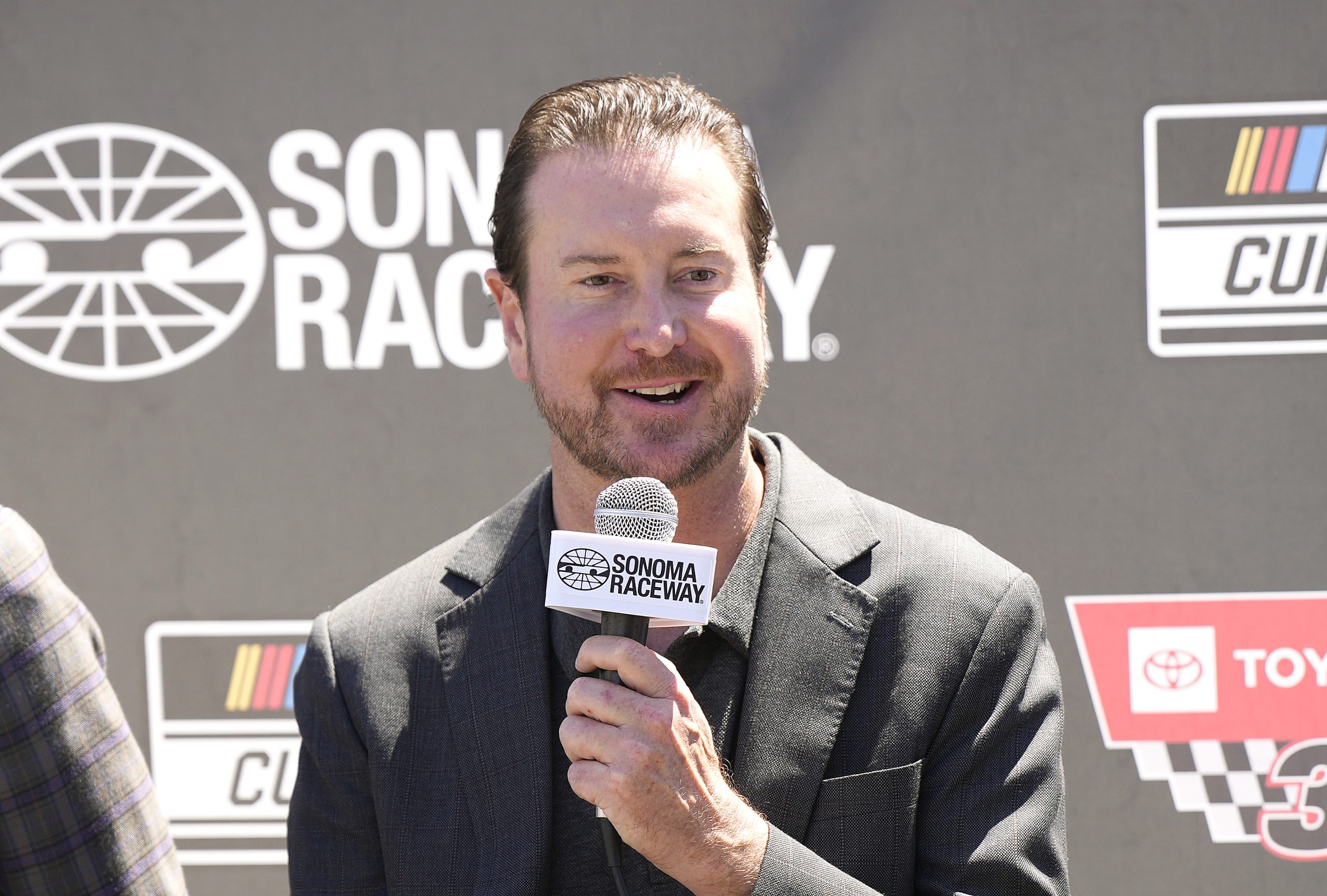 SAN FRANCISCO, CALIFORNIA - JUNE 09: NASCAR driver Kurt Busch, driver of the No. 45 car for the 23XI racing team speaks to the media during a press conference at the Atwater Tavern on June 09, 2022 in San Francisco, California. The press conference is being held prior to the Toyota/Save Mart 350 NASCAR Cup Series race at the Sonoma Raceway on June 12. (Photo by Thearon W. Henderson/Getty Images)