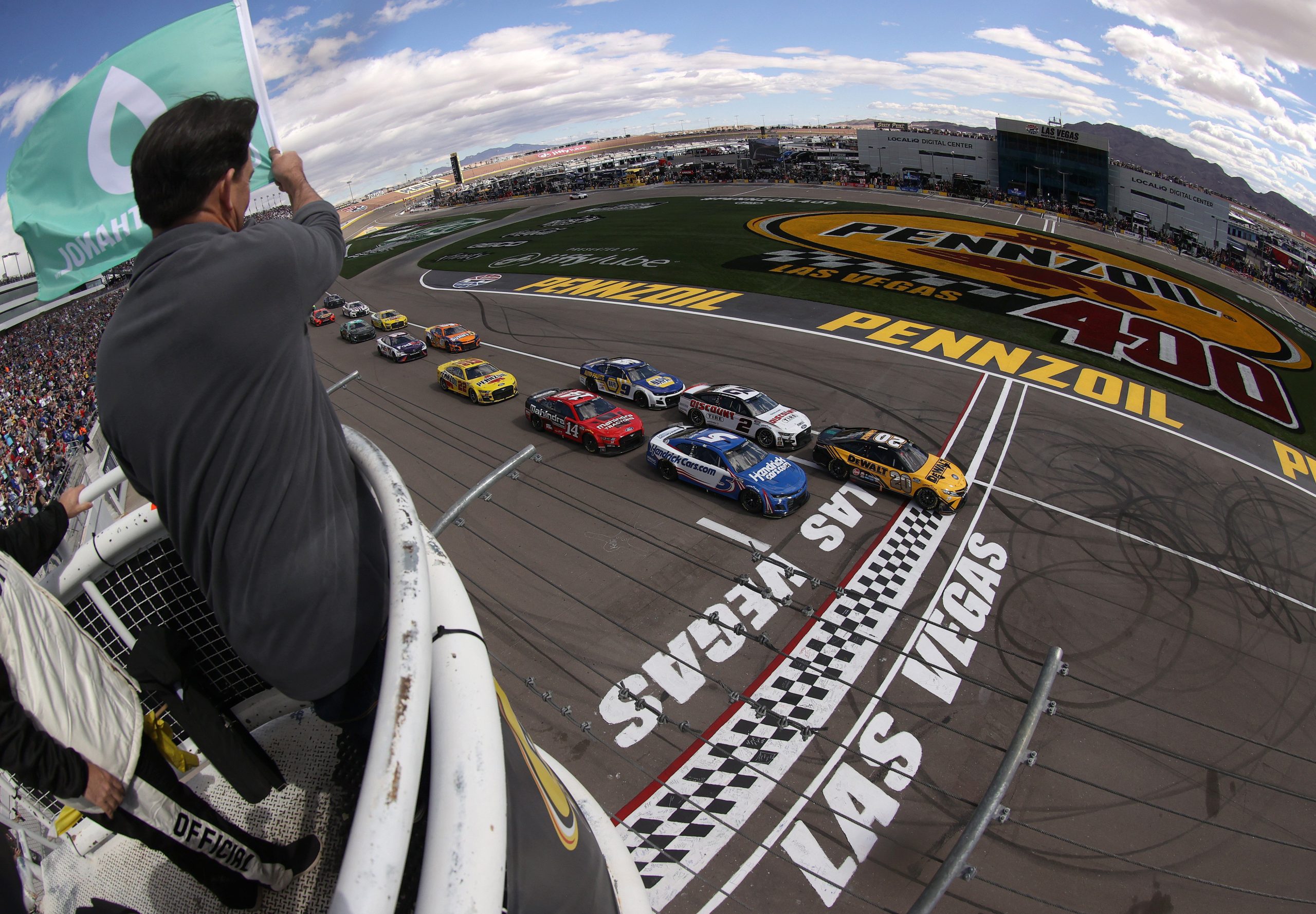 LAS VEGAS, NEVADA - MARCH 06: Christopher Bell, driver of the #20 DeWalt Toyota, leads the field to the green flag to start the NASCAR Cup Series Pennzoil 400 at Las Vegas Motor Speedway on March 06, 2022 in Las Vegas, Nevada. (Photo by Dylan Buell/Getty Images)