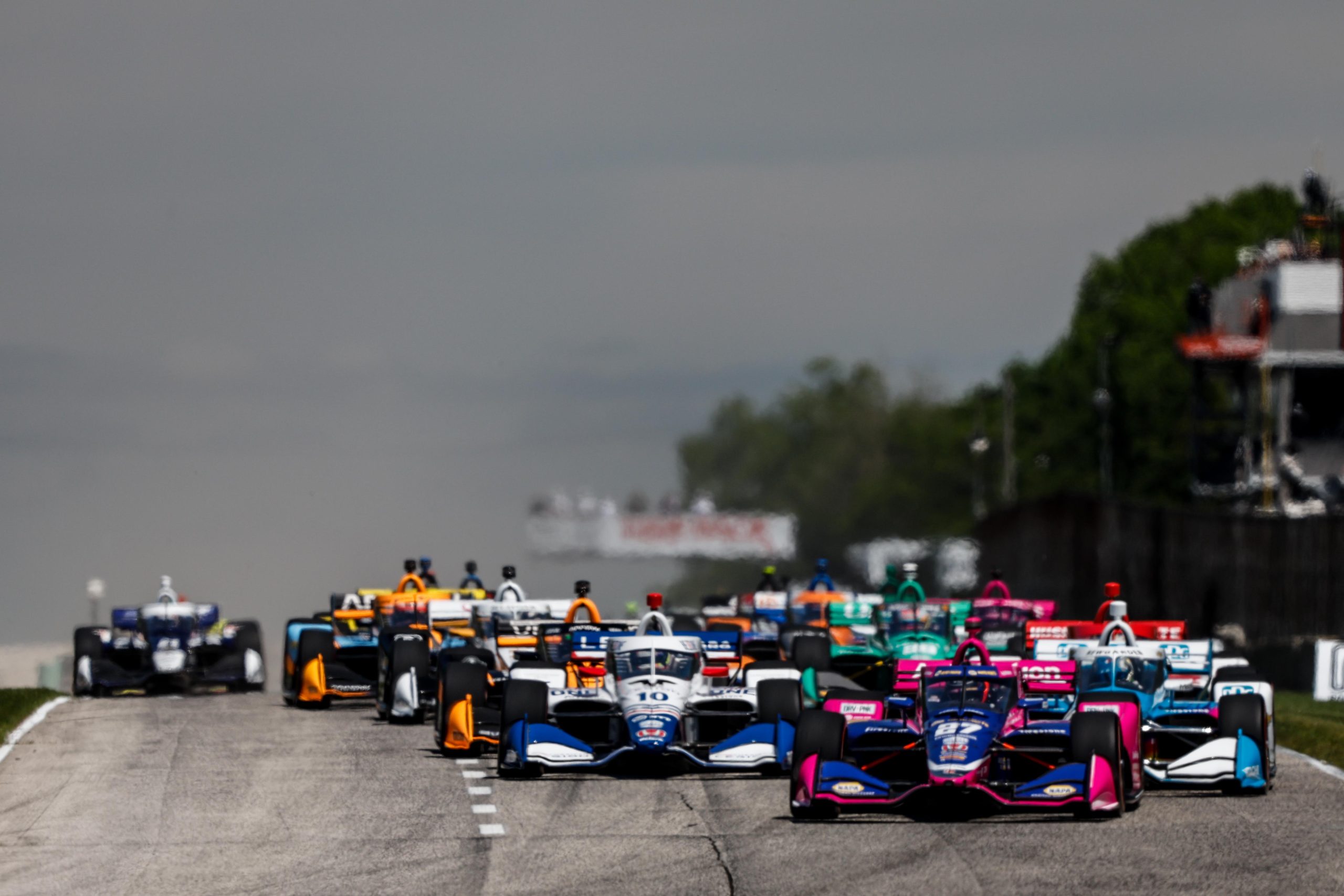 Alexander Rossi leads the field at the start of the 2022 Sonsio Grand Prix at Road America. (Joe Skibinski/Penske Entertainment)