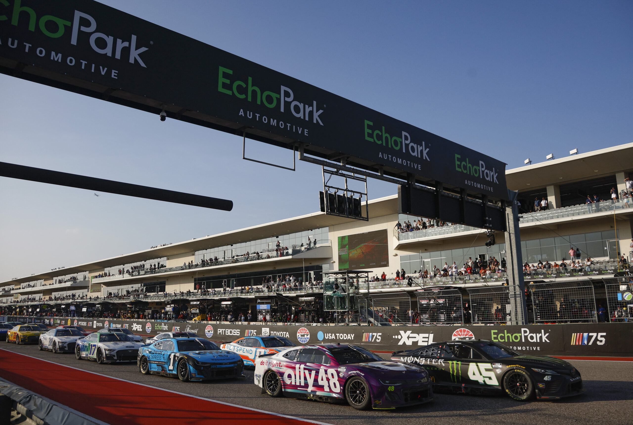 Tyler Reddick, driver of the #45 Monster Energy Toyota, and Alex Bowman, driver of the #48 Ally Chevrolet, lead the field to an overtime restart during the NASCAR Cup Series EchoPark Automotive Grand Prix at Circuit of The Americas on March 26, 2023 in Austin, Texas. Kamui Kobayashi Daniil Kvyat