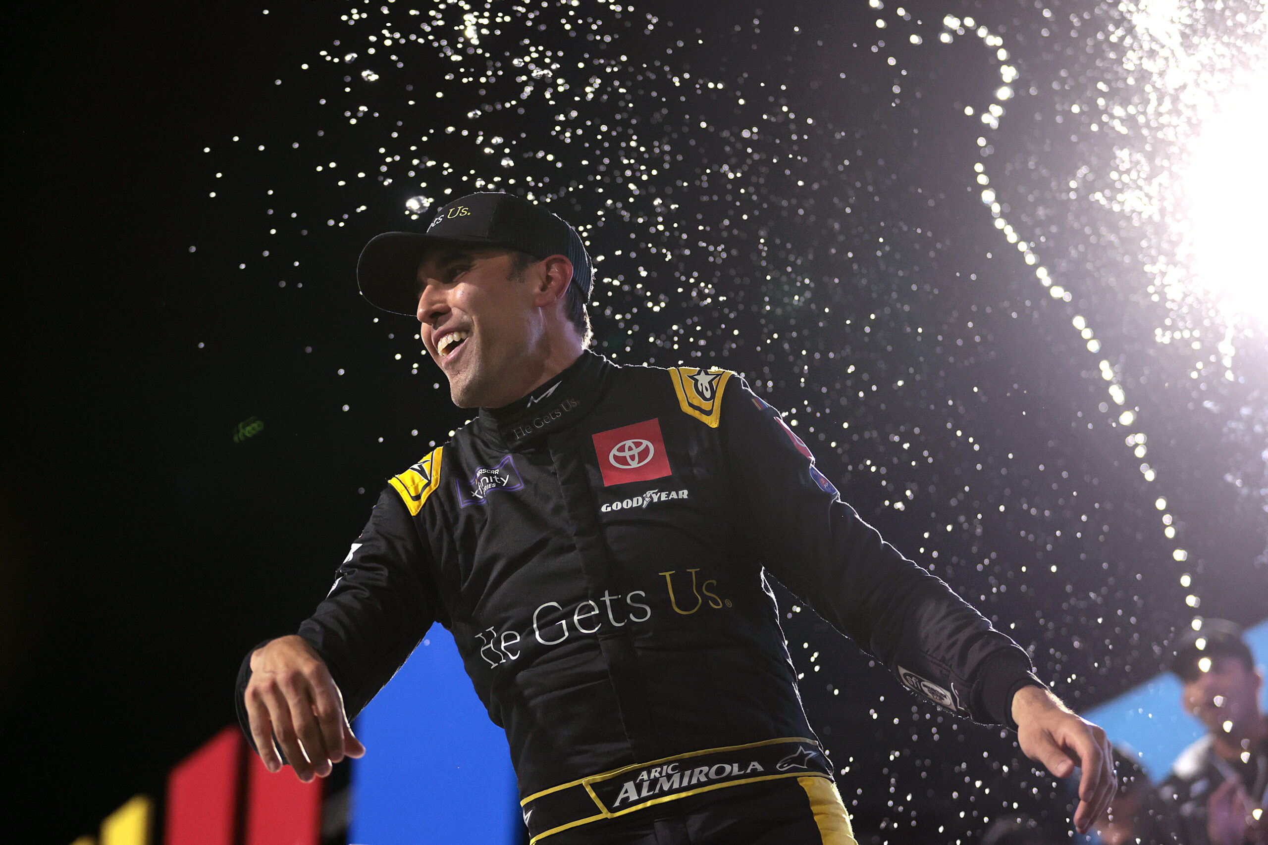 MARTINSVILLE, VIRGINIA - APRIL 06: Aric Almirola, driver of the #20 He Gets Us Toyota, celebrates in victory lane after winning the NASCAR Xfinity Series DUDE Wipes 250 at Martinsville Speedway on April 06, 2024 in Martinsville, Virginia. (Photo by James Gilbert/Getty Images)