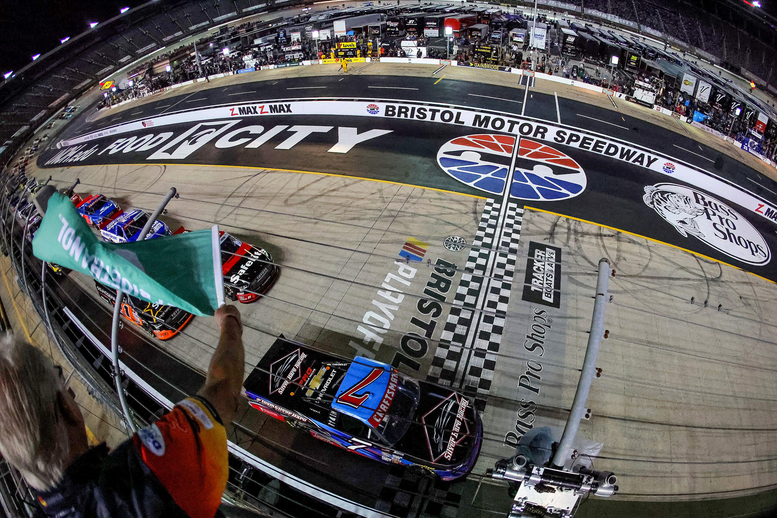 BRISTOL, TENNESSEE - SEPTEMBER 19: Connor Zilisch, driver of the #7 Silver Hare Racing Chevrolet, leads the field to the green flag to start the NASCAR Craftsman Truck Series UNOH 200 presented by Ohio Logistics at Bristol Motor Speedway on September 19, 2024 in Bristol, Tennessee.