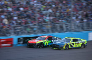 AVONDALE, ARIZONA - NOVEMBER 05: William Byron, driver of the #24 Axalta Chevrolet, and Ryan Blaney, driver of the #12 Menards/Dutch Boy Ford, race during the NASCAR Cup Series Championship at Phoenix Raceway on November 05, 2023 in Avondale, Arizona. (Photo by Jared C. Tilton/Getty Images)