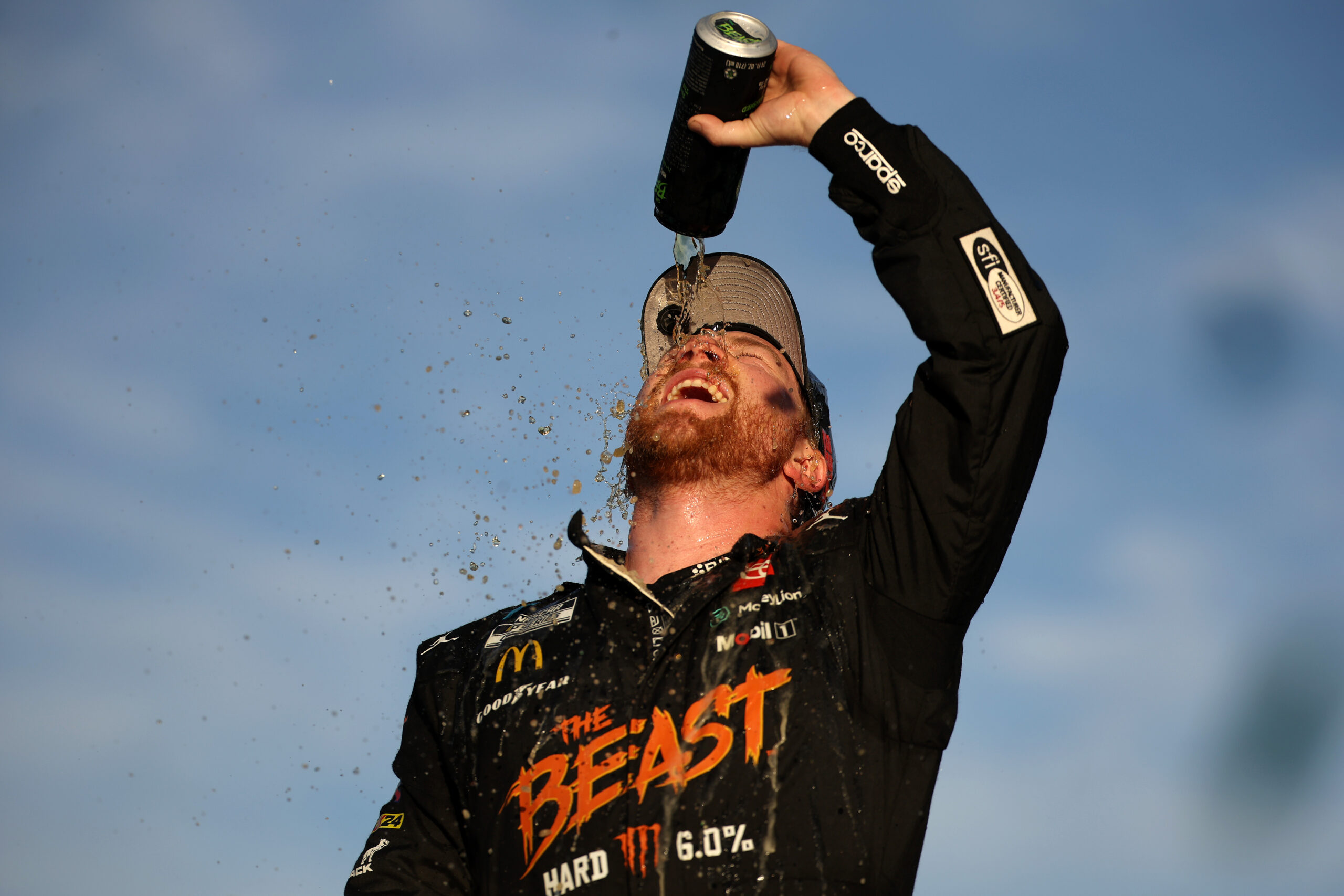 HOMESTEAD, FLORIDA - OCTOBER 27: Tyler Reddick, driver of the #45 The Beast Killer Sunrise Toyota, celebrates in victory lane after winning the NASCAR Cup Series Straight Talk Wireless 400 at Homestead-Miami Speedway on October 27, 2024 in Homestead, Florida. (Photo by James Gilbert/Getty Images)