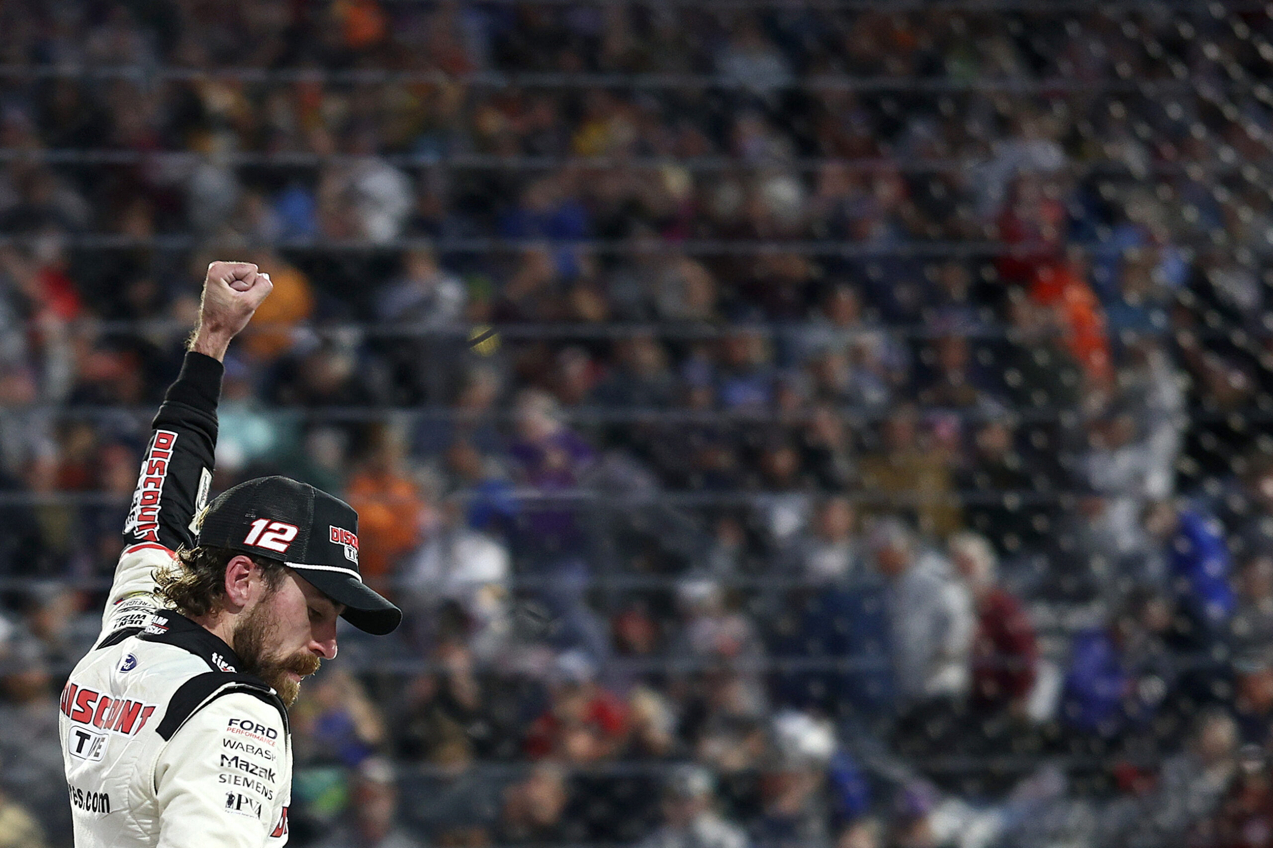 MARTINSVILLE, VIRGINIA - NOVEMBER 03: Ryan Blaney, driver of the #12 Discount Tire Ford, celebrates after winning the NASCAR Cup Series Xfinity 500 at Martinsville Speedway on November 03, 2024 in Martinsville, Virginia. (Photo by Jared C. Tilton/Getty Images)