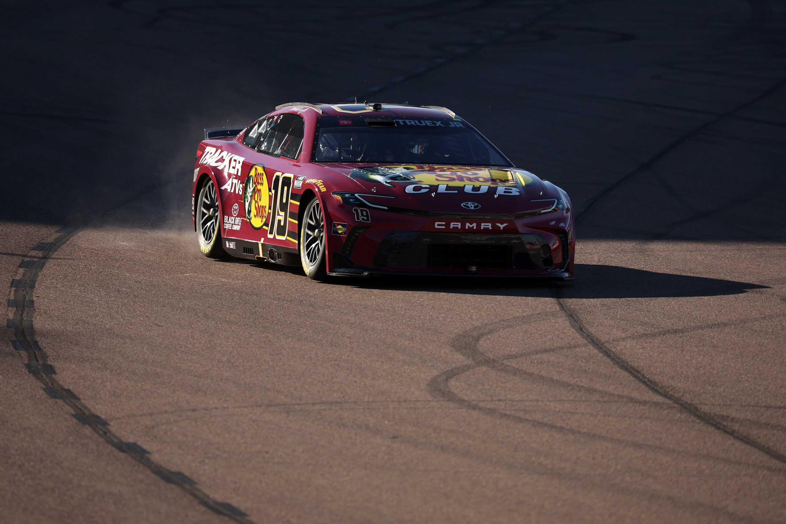 AVONDALE, ARIZONA - NOVEMBER 09: Martin Truex Jr., driver of the #19 Bass Pro Shops Toyota, drives during qualifying for the NASCAR Cup Series Championship Race at Phoenix Raceway on November 09, 2024 in Avondale, Arizona. (Photo by James Gilbert/Getty Images)