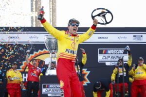 AVONDALE, ARIZONA - NOVEMBER 10: Joey Logano, driver of the #22 Shell Pennzoil Ford, celebrates in victory lane after winning the NASCAR Cup Series Championship Race at Phoenix Raceway on November 10, 2024 in Avondale, Arizona. (Photo by Chris Graythen/Getty Images)