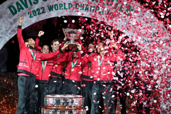 Canada with the Davis Cup trophy.