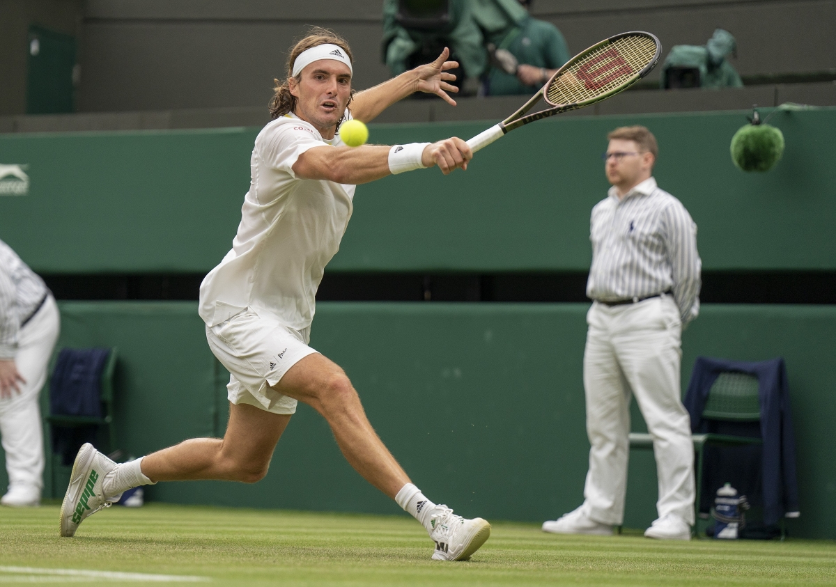 Stefanos Tsistsipas in action at Wimbledon.