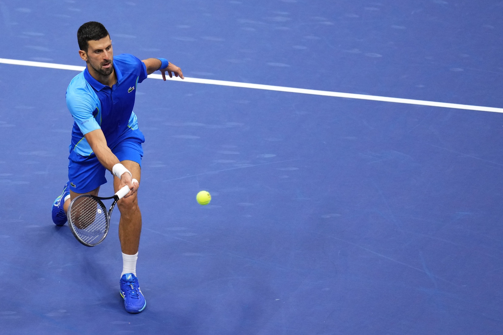 Novak Djokovic in action ahead.