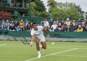 Giovanni Mpetshi Perricard in action at Wimbledon