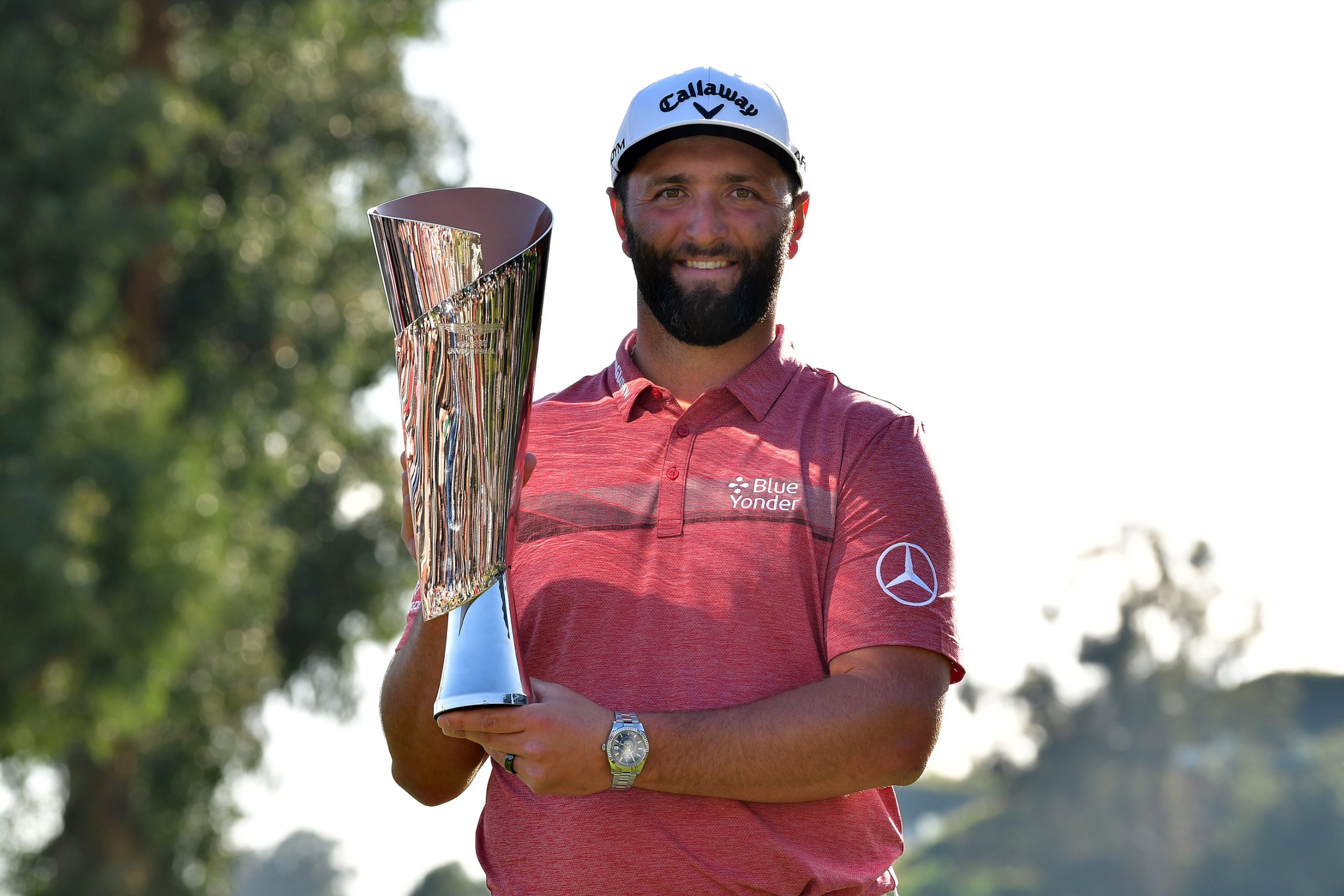 John Rahm with trophy at The Genesis Invitational